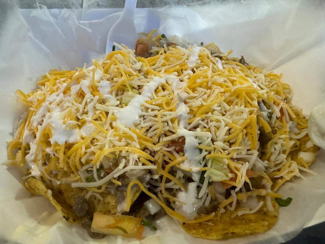 An order of loaded steak nachos is shown from a Nathan’s Taqueria concession stand at Kroger Field during UK football’s season-opening game against Southern Miss.