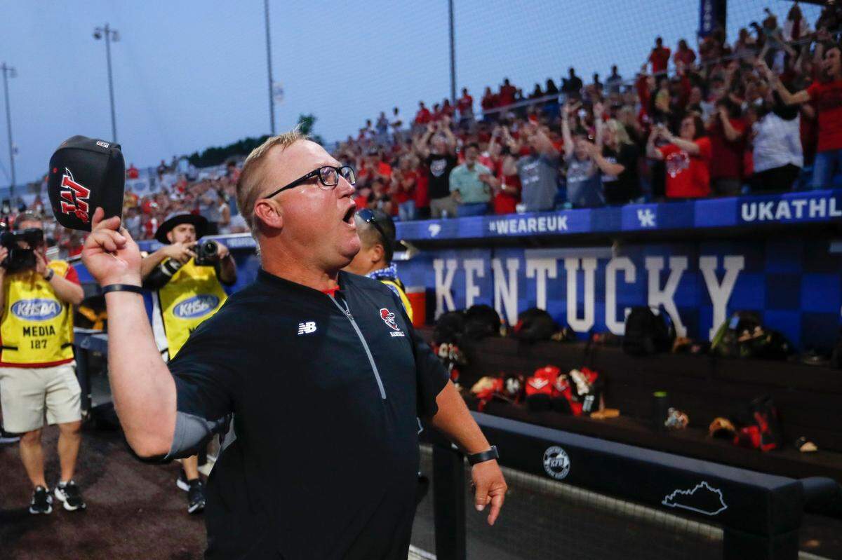 Whitley County head coach Jeremy Shope celebrates his team’s state championship. “I had a special group of kids that bought in from day one and got this thing rolling,” he said.