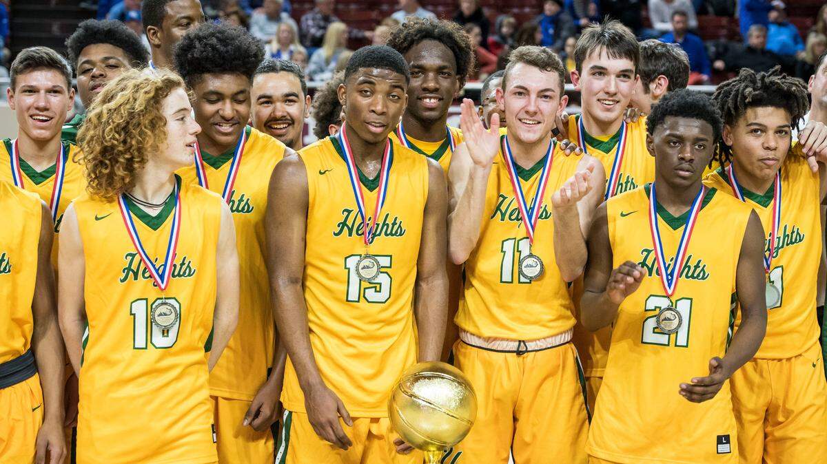 University Heights Academy celebrated with the championship trophy after defeating LCA 52-40 in the finals of the boys’ All “A” Classic.
