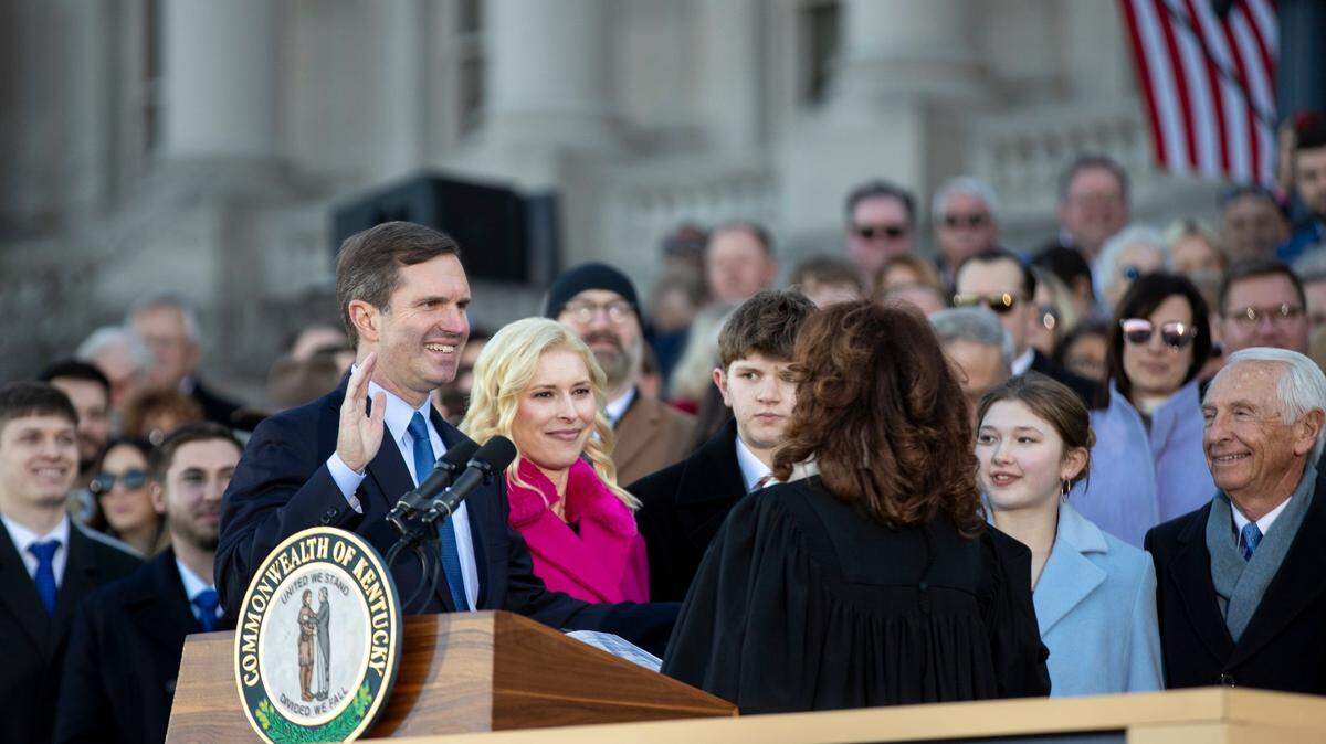 Gov. Andy Beshear is sworn in for his second term during his inauguration ceremony at the Capitol in Frankfort, Ky., December 12, 2023.