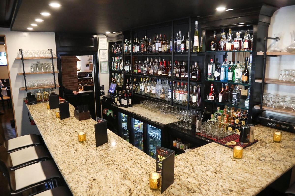 The bar features a smaller menu to go with cocktails during happy hour.