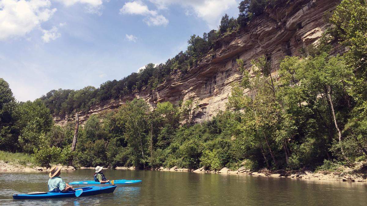 In recent years, Elkhorn Creek has become a popular destination for canoes and kayaks. The water is surrounded by high limestone cliffs, called palisades, and rich farmland.