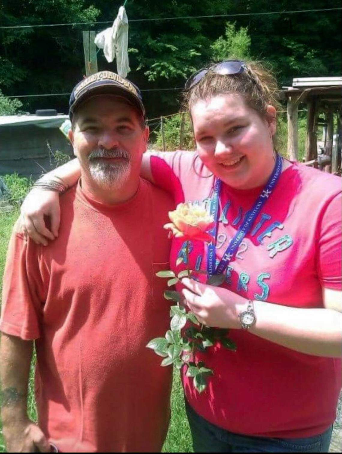 Stephen Brock with his daughter, Hayley Everage, in 2012. Brock grew the rose for his daughter.