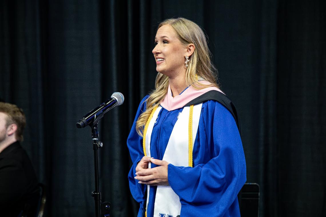 Samantha Goette sings the national anthem during the 2PM UK graduation ceremony at Central Bank Center on May 9, 2025, in Lexington, Ky.