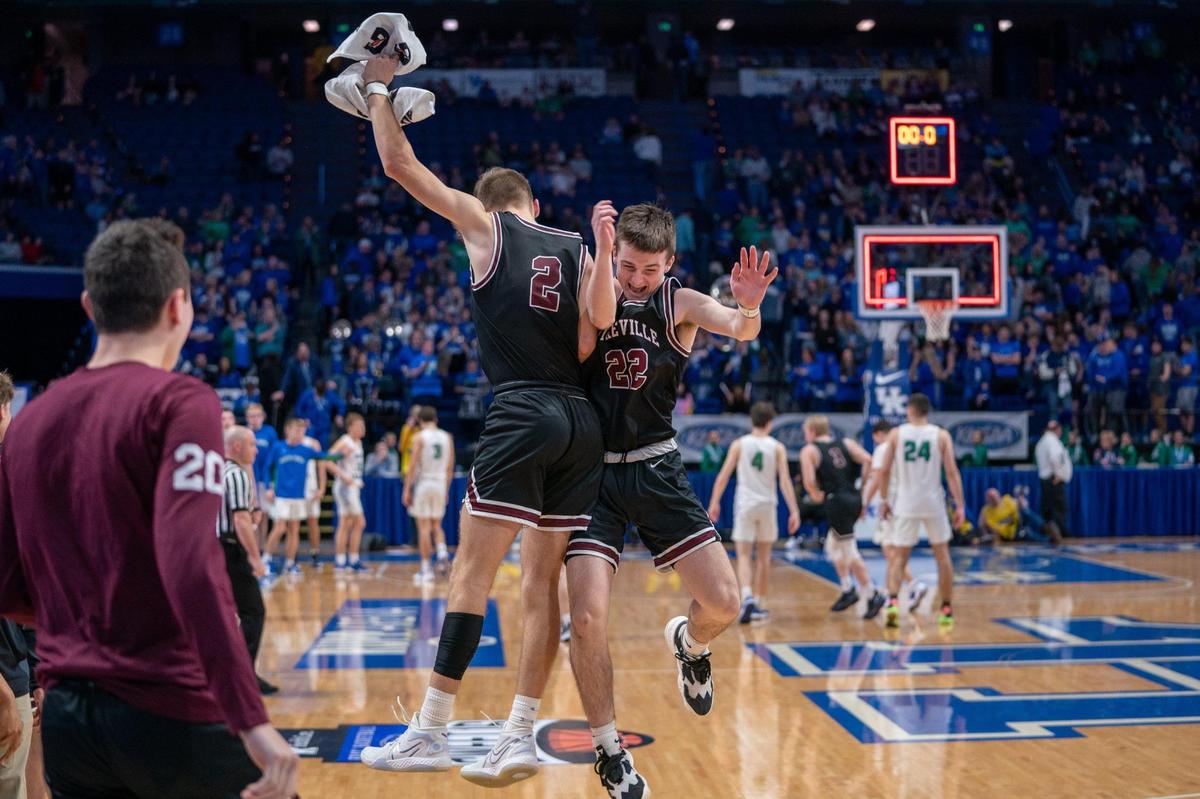 Tate Walters (2) and Heath Jarrell (22) celebrate Pikeville’s opening-round win over North Laurel. The Panthers, champions of this season’s All “A” Classic, will play No. 1 Clark County next.