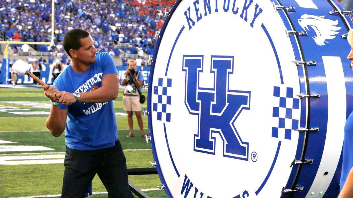 Former UK quarterback Andre Woodson banged the “Big Blue Drum“ during a pregame ceremony before the Kentucky-Florida football game on Saturday.