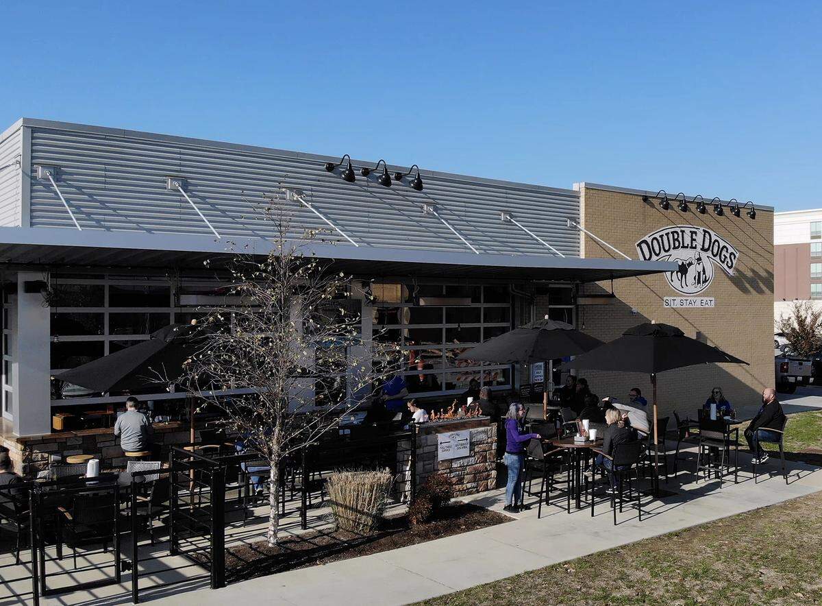 Dogs are welcome on the patio at Double Dogs in Hamburg, but only four tables are available because of social distancing.