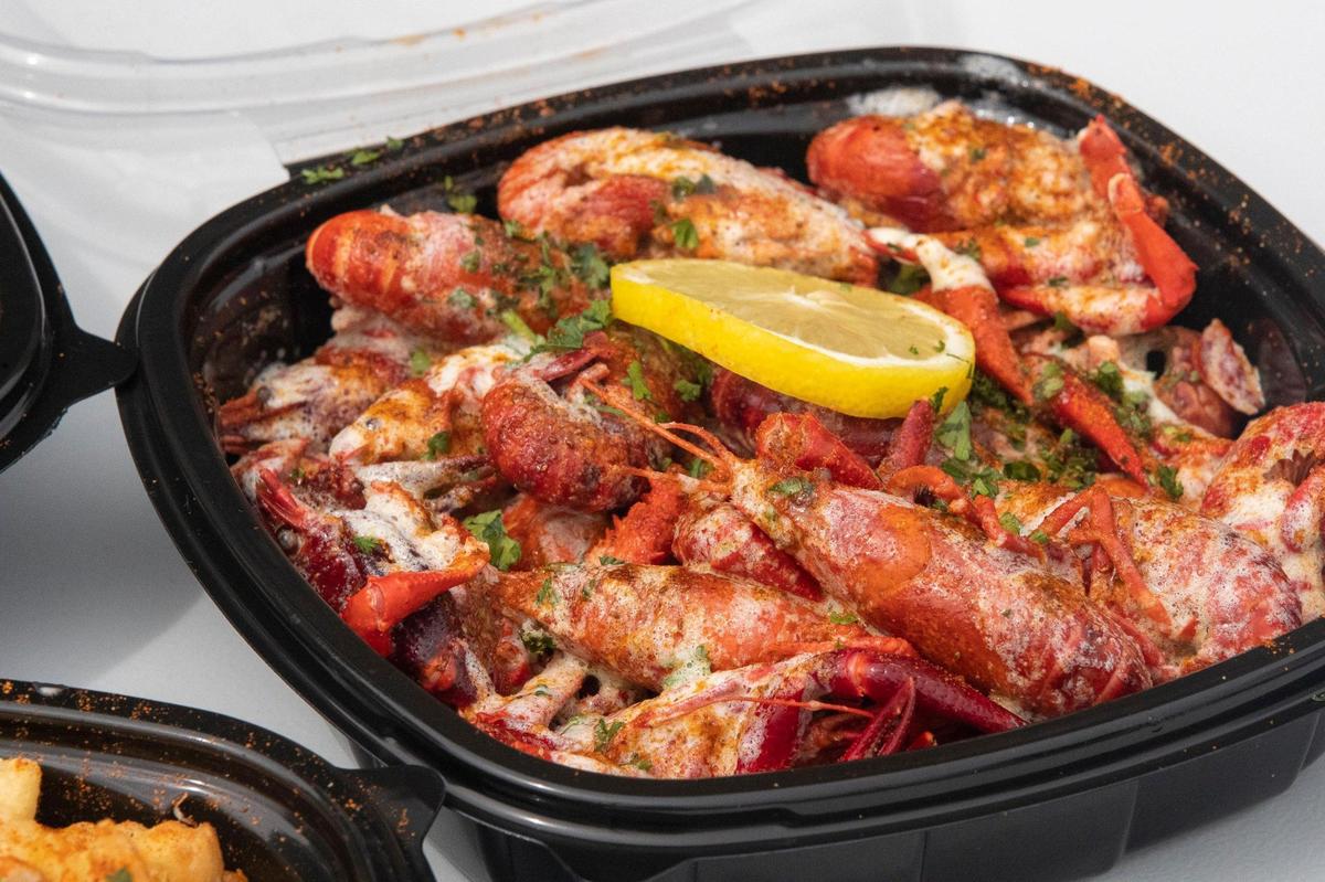 A serving of crawfish at Seafood Lady at 833 Georgetown Street in Lexington, Ky., on Thursday, Aug. 28, 2020. The carryout restaurant features Cajun-style seafood boils with lobster, oysters, crabs, shrimp, fish, Southern seafood, plus po’boys and more.