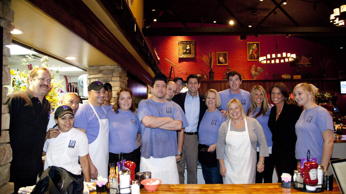 GOP vice presidential candidate Paul Ryan posed with employees of Josie's, where he, his family and an entourage of staffers and Secret Service agents ate breakfast Friday.  