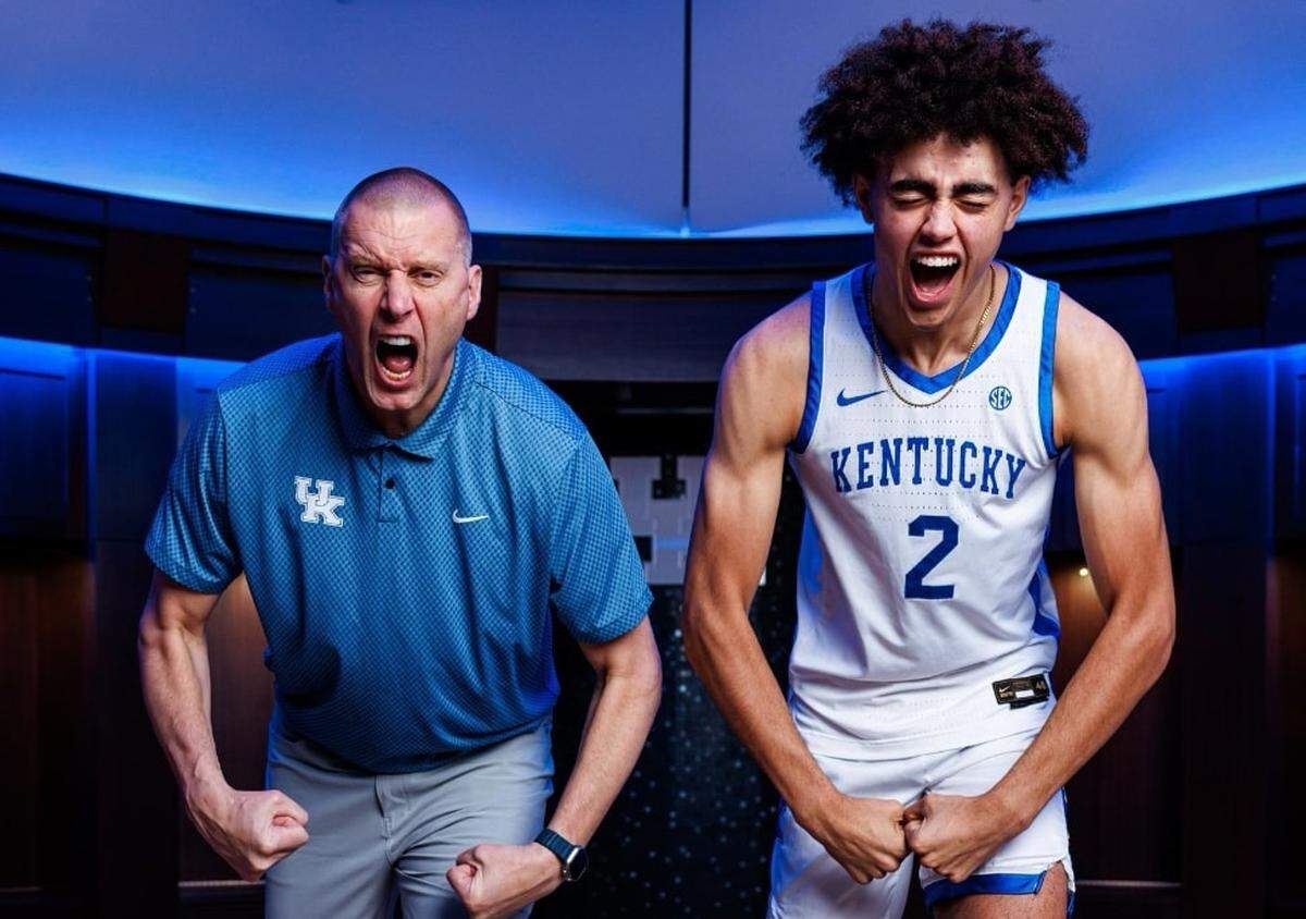 Great Crossing basketball star Malachi Moreno, right, poses with Kentucky basketball coach Mark Pope during a visit to campus earlier this year.