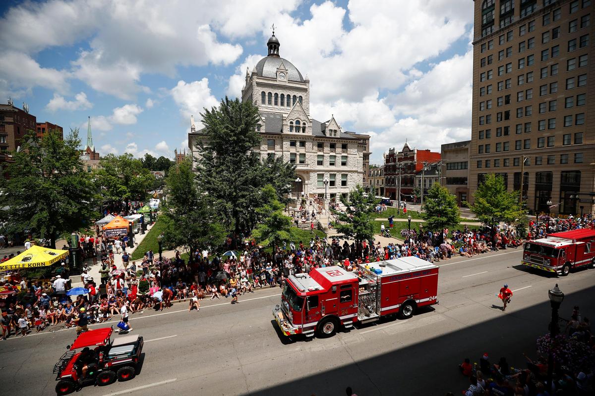 Lexington firefighters traveled in front of the old Fayette County courthouse during the city of Lexington’s Fourth of July parade along Main Street in downtown Lexington Thursday.