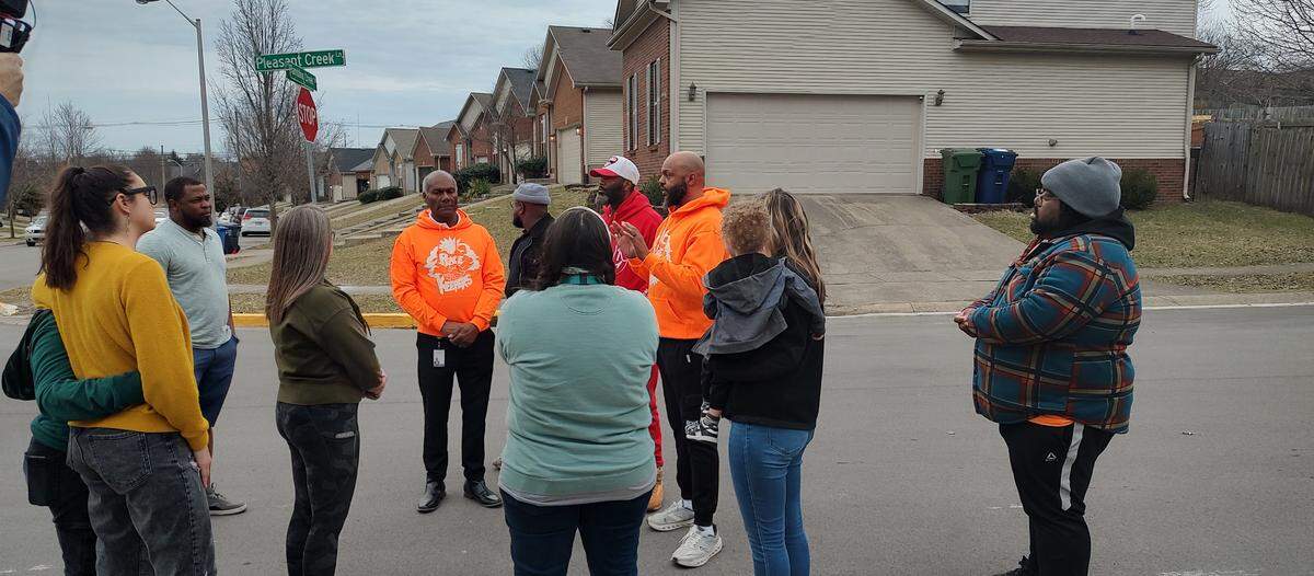 Representatives of One Lexington gathered on Rambling Creek Drive to offer neighborhood support after a shooting left a 16-year-old dead Tuesday.