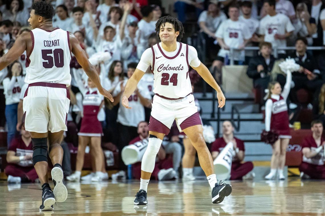 Isaiah Cozart (50) congratulates Michael Moreno (24) during a game earlier this season. Moreno will finish his career as EKU’s all-time leader in 3-pointers made.