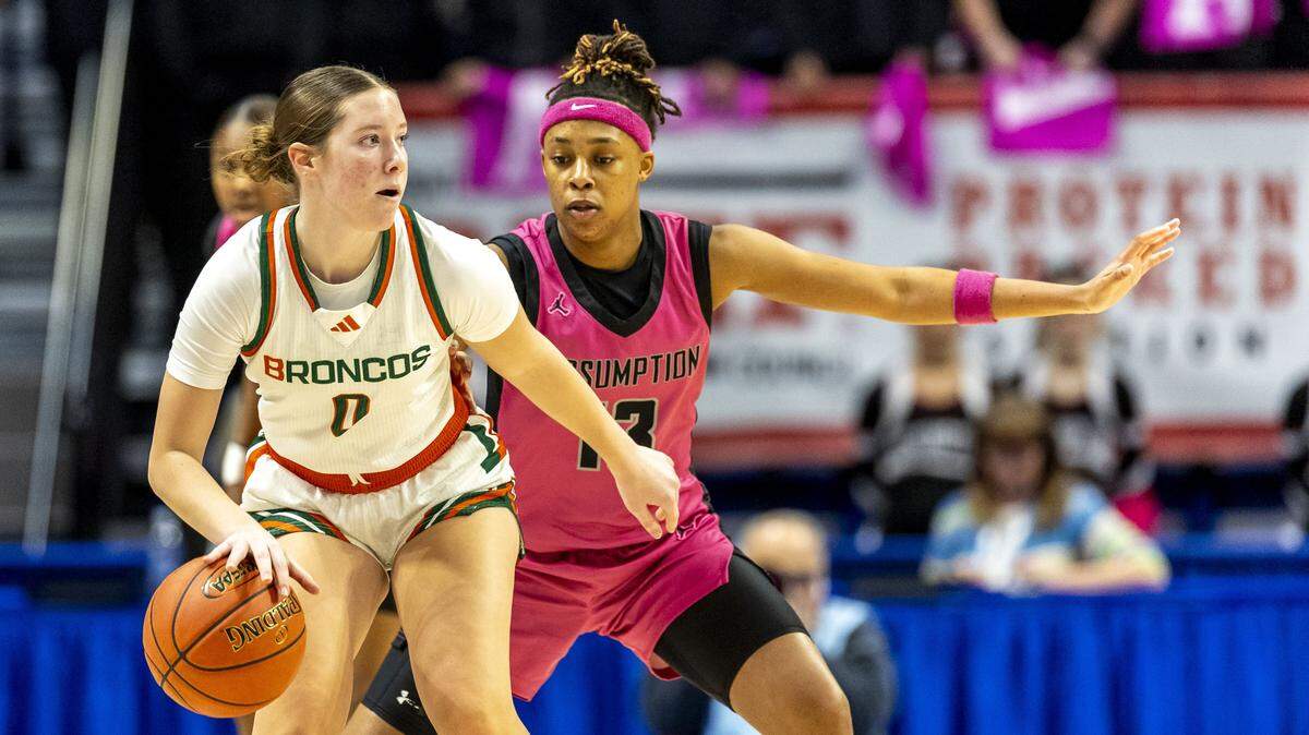 Frederick Douglass' Reagan Gregonis (0) is guarded by Assumption's Ashlinn James (13) during a second-round game in the 2026 Clark's Pump-N-Shop Girls' Basketball Sweet 16, Friday, March 13, 2026 at Rupp Arena in Lexington, Ky.