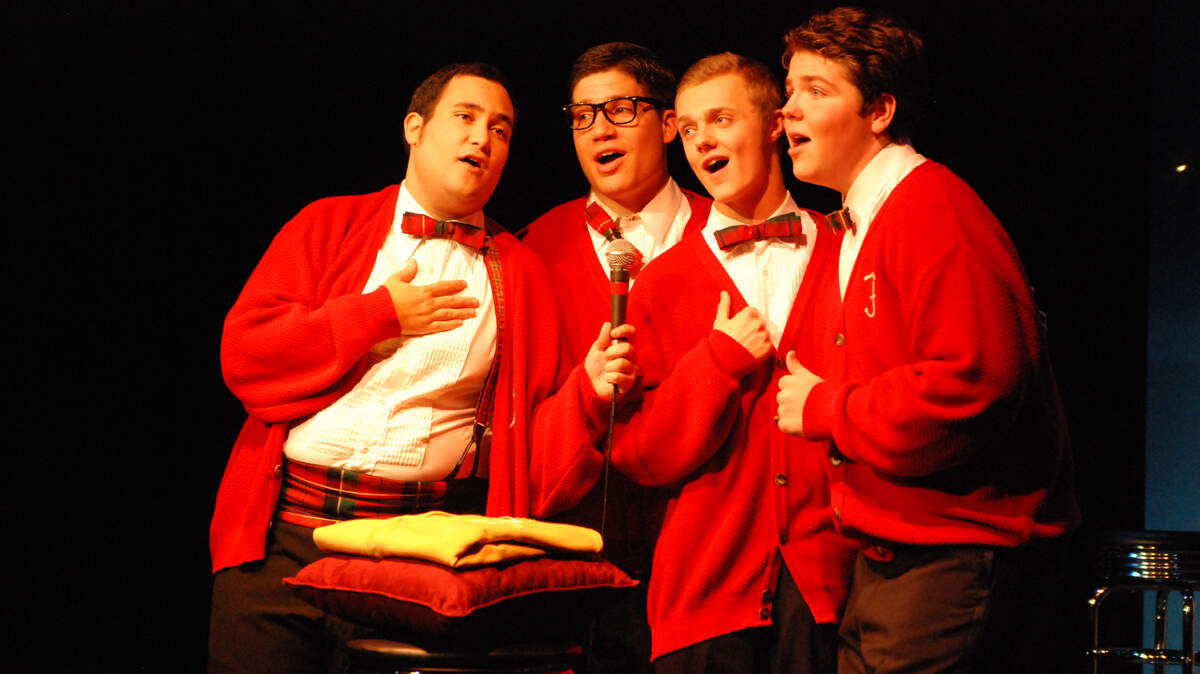 As The Plaids, Justin Miller, left, Ryan Hornung, Connor Hall and Zack Damron perform a tribute to crooner Perry Como.
