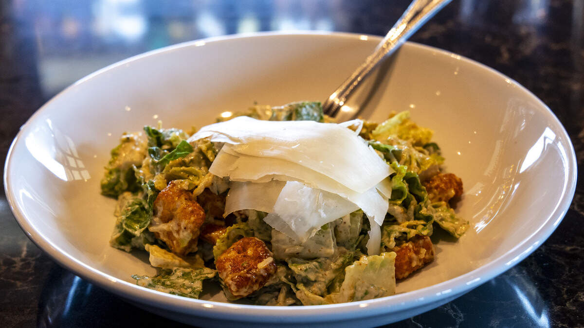 A Caesar salad from Firebirds Wood Fired Grill, a new Lexington restaurant opening in Hamburg. All salad dressings are made in house.