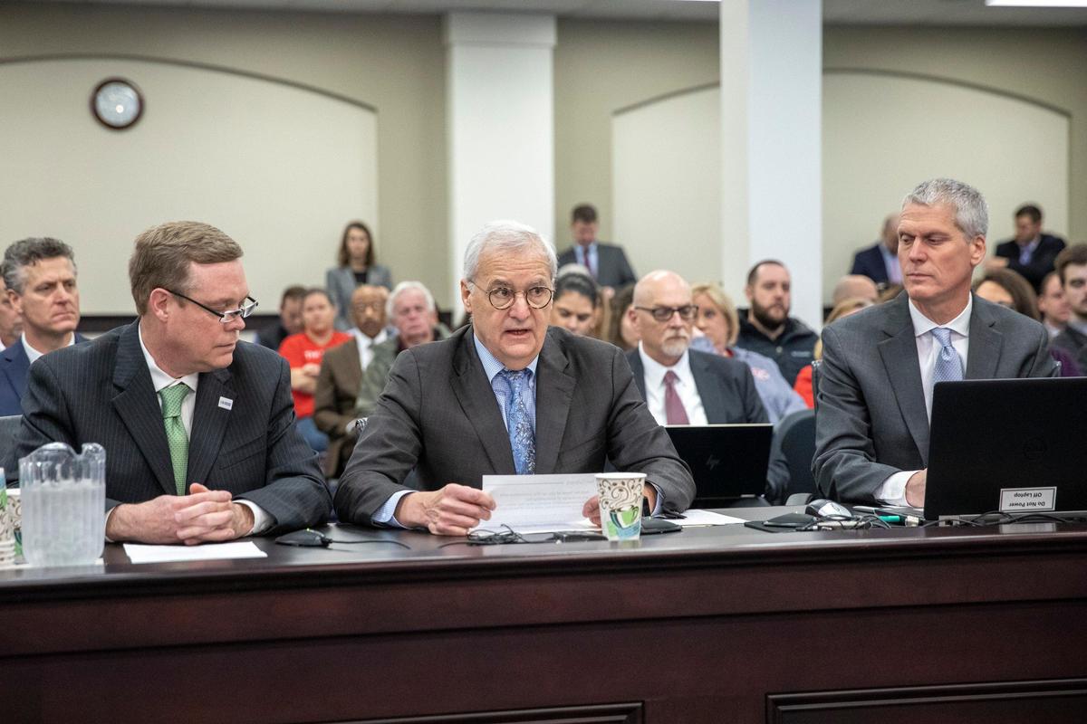 Tom Modrowski, center, interim CEO of Braidy Industries, speaks while Gregg Whigham, left, general manager of primary operations, and Shane Schuler, general manager of finishing operations, listen during a Kentucky Senate Appropriations and Revenue Committee hearing at the Kentucky state Capitol Annex in Frankfort, Ky., Tuesday, Feb. 11, 2020.