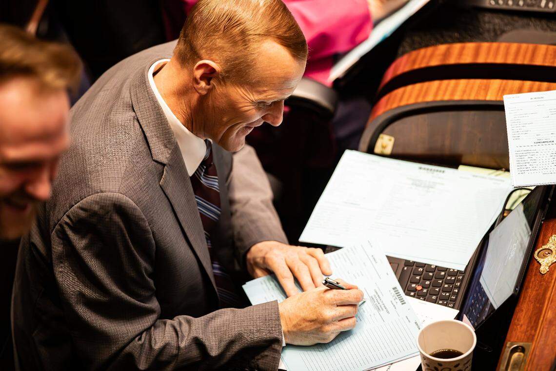 Rep. Josh Calloway (R- Irvington) completes a Commonwealth of Kentucky 2025 Regular Sessions General Assembly form on the House floor during regular sessions on Wednesday, February 12, 2025, at the Kentucky State capitol in Frankfort, Ky.  