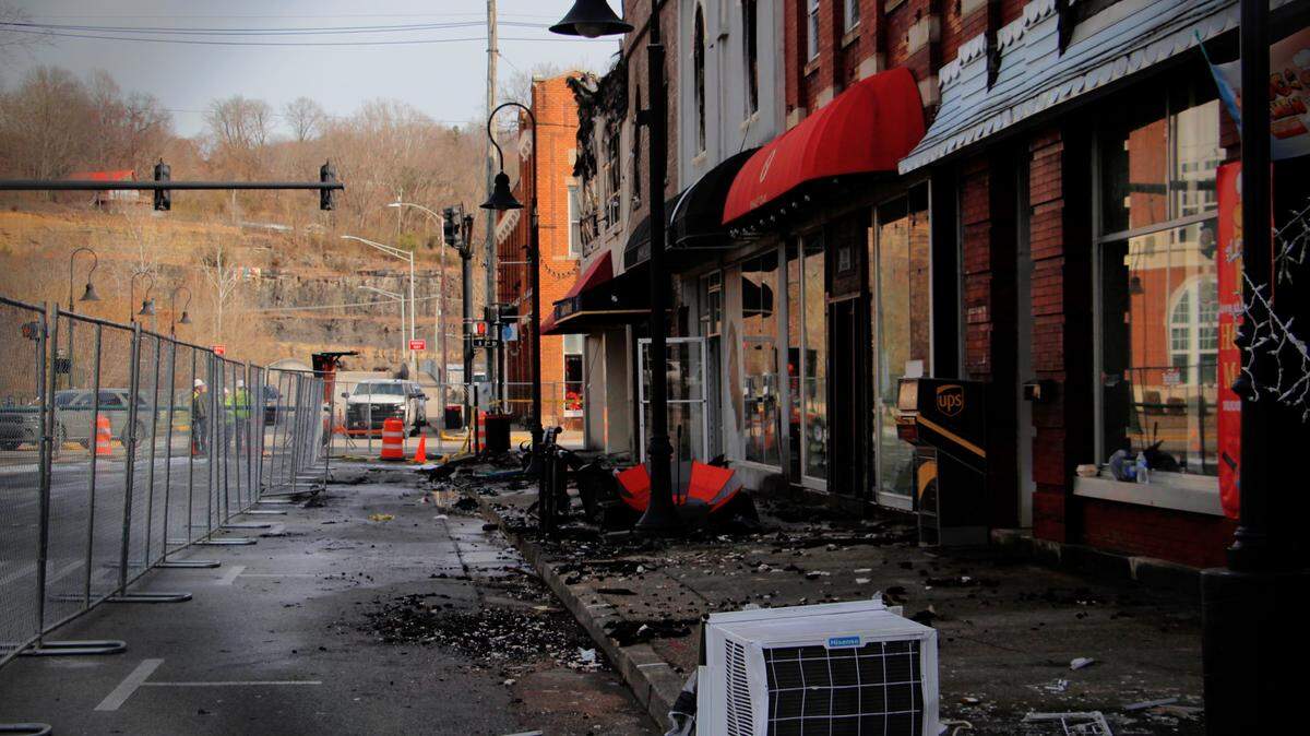 Main Street in downtown Williamsburg, Ky., remains cordoned off Jan. 22, 2026, after a fire tore through several businesses fronting the historic courthouse Jan. 20, 2026.