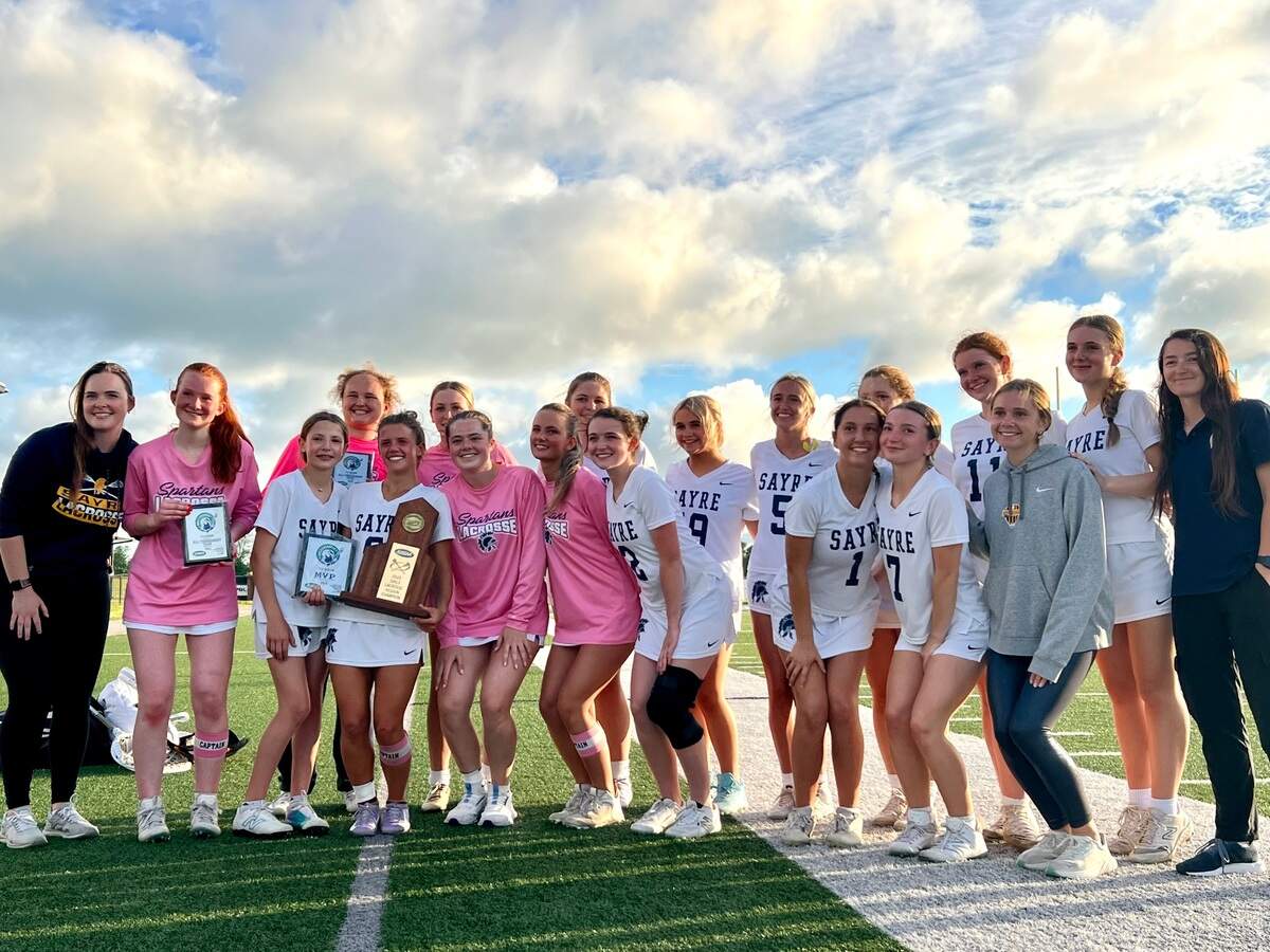 Sayre celebrates winning the 7th Region girls lacrosse championship 9-7 against Henry Clay.