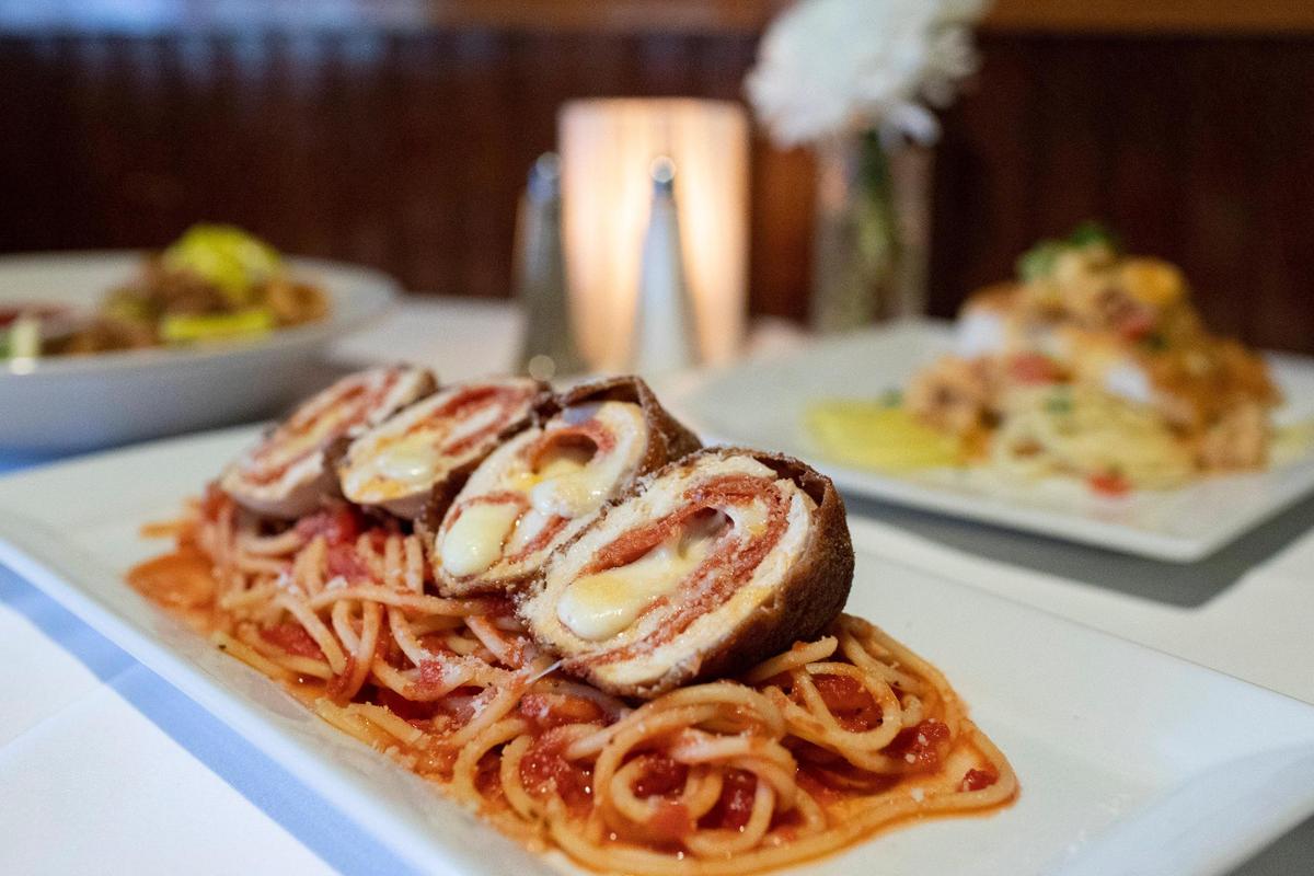 Giuseppe’s chicken pepperoni, chicken breasts lightly breaded, fried and stuffed with pepperoni and provolone, over a bed of spaghetti with marinara.