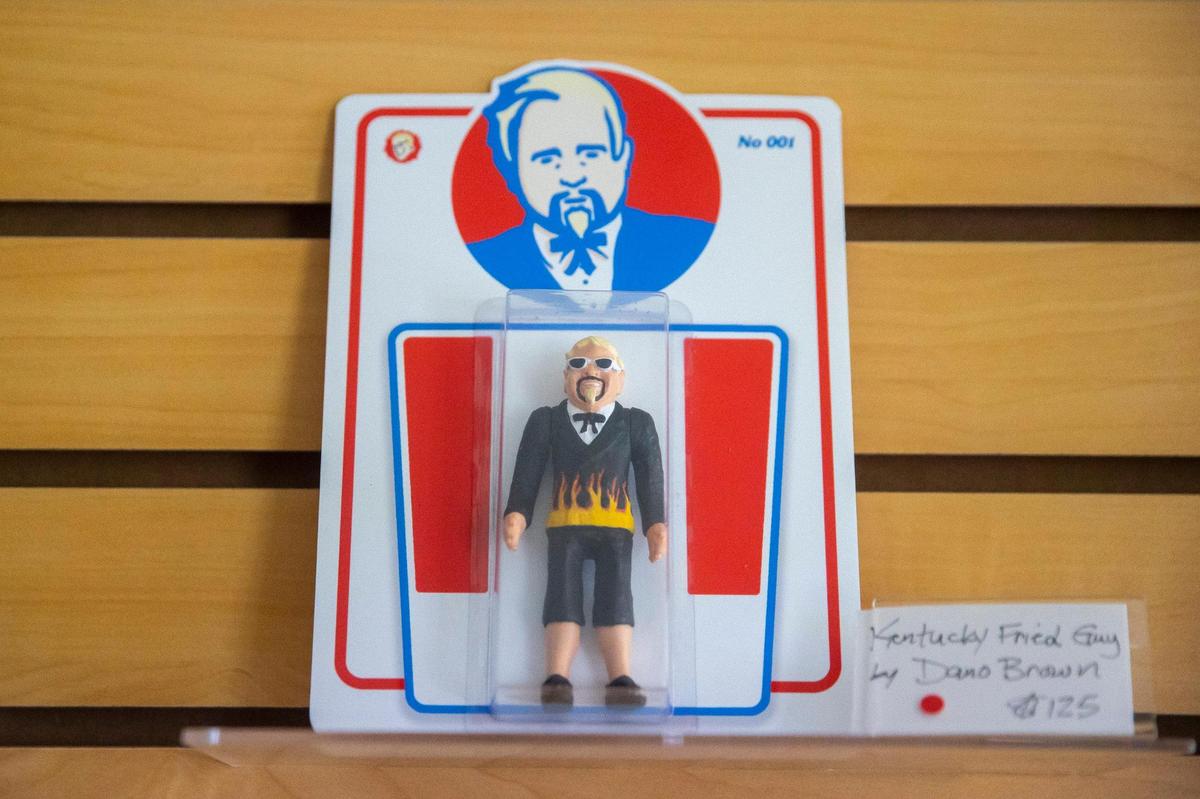 Dano Brown created “Kentucky Fried Guy” for a group art toy show featuring interpretations of Colonel Sanders-style resin figures sculpted by Scott Cherry. The art show is on display at Earth to Kentucky in Covington, Ky., through May 8.