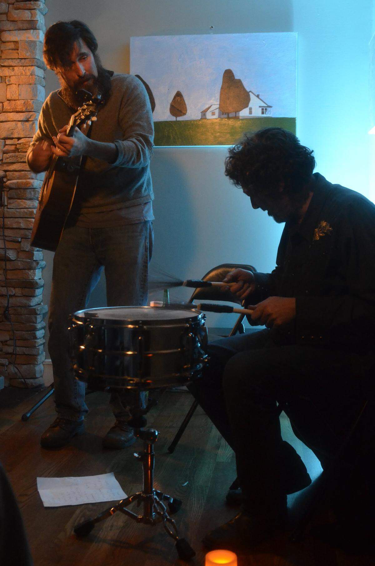 Otto Helmuth and Tim Welch played to the crowd at the Raven House, a house concert in Lexington in December 2015..