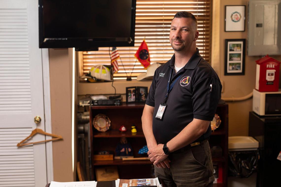 Emergency Management Director, David McGill, poses for a photo in his office in Harlan, Ky., Friday, April 9, 2021.