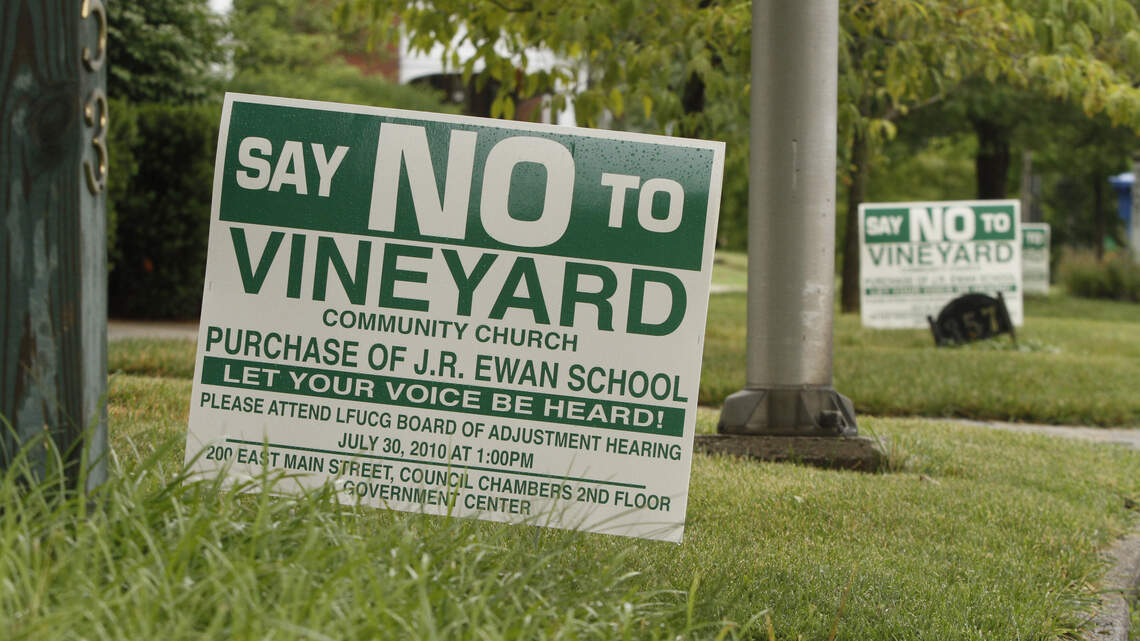 Some Fairway residents post signs opposing Vineyard church relocation