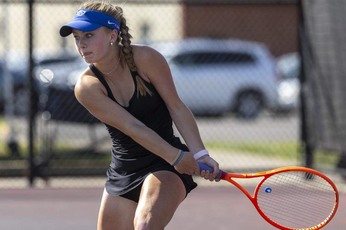 LCA's Katie Lankford returns the ball during the 11th Region boys and girls tennis championships in singles and doubles competition at Eastern Kentucky University Tennis Courts in Richmond on Wednesday, May 13, 2026.