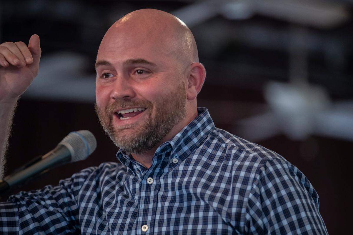 Michael Bowman, Democratic candidate for treasurer, speaks during the Fancy Farm picnic in Fancy Farm, Ky., on Saturday, Aug. 5, 2023.
