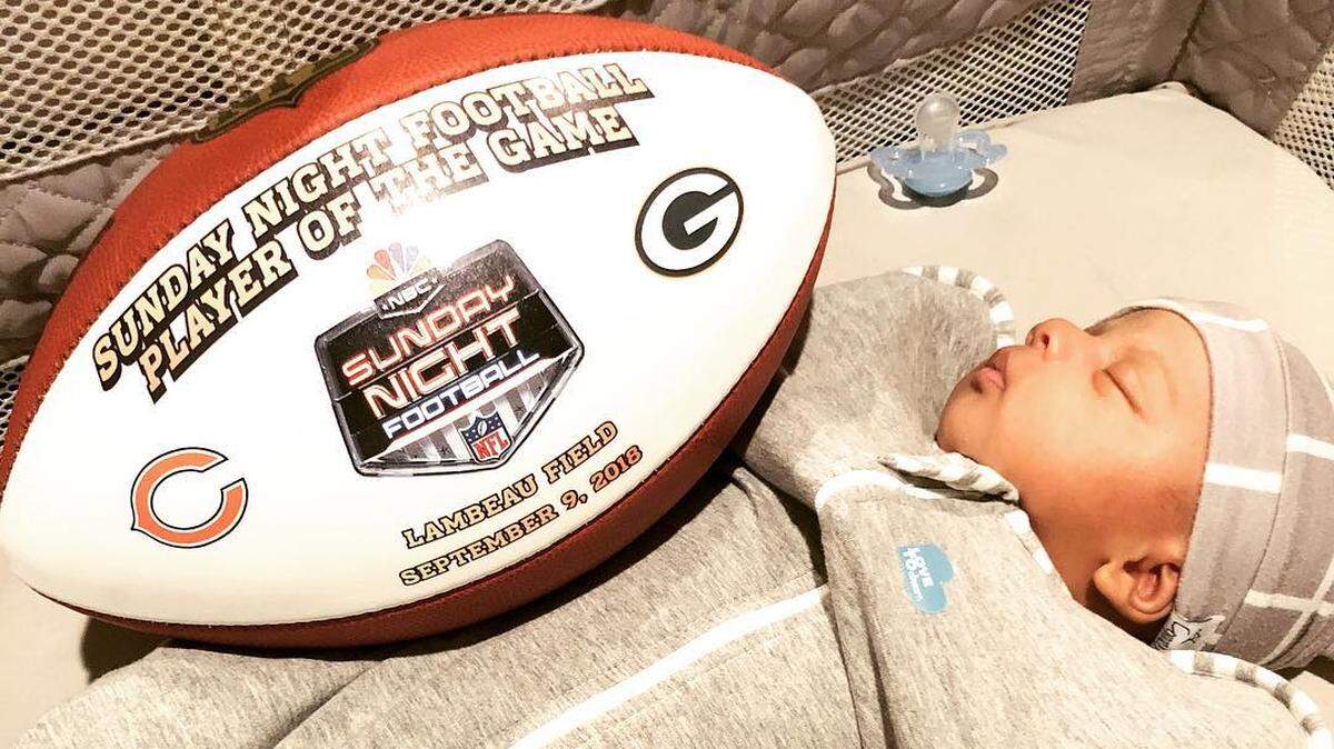 Randall Cobb, the former Kentucky football star who Sunday night caught a 75-yard touchdown pass for the Green Bay Packers, celebrated the victory by giving his newborn son, Caspian, his NBC game ball.