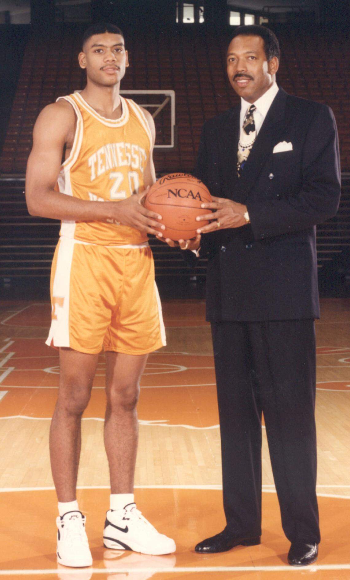 Former Ballard High School star Allan Houston, left, Kentucky’s 1989 Mr. Basketball, became the all-time leading scorer in Tennessee Volunteers men’s basketball history (2,801 career points) while playing for his father, Wade Houston, from 1989 through 1993.