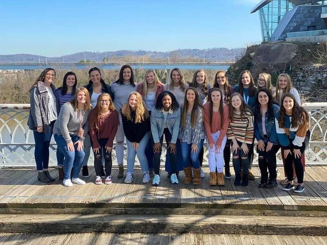Former UK pitcher Kelsey Nunley (far left) posed with players from Soddy Daisy High School, the program she pitched for as a prep player and now coaches.