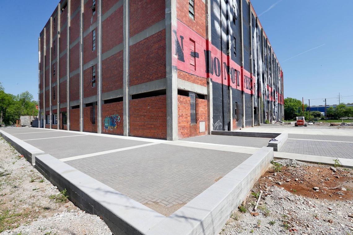 Brewery patrons will be able to use the patio along the creek after Christian Paumi, an EKU chemistry professor, opens his Fusion Brewery on the ground floor of the Pepper campus rick house in the Distillery District on Manchester Street sometime in 2019.