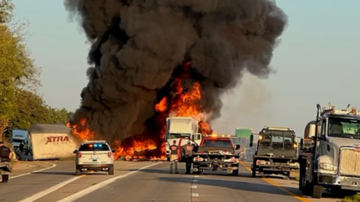 Smoke billowed high above a fire that broke out as a result of the crash.