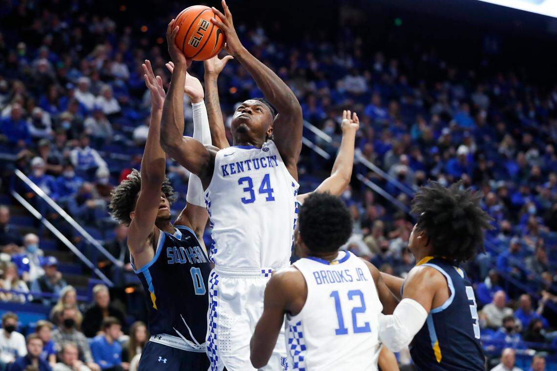 Kentucky Wildcats forward Oscar Tshiebwe (34) shoots over Southern University Jaguars forward Terrell Williams (0) during a game at Rupp Arena in Lexington, Ky., Tuesday, Dec. 7, 2021.
