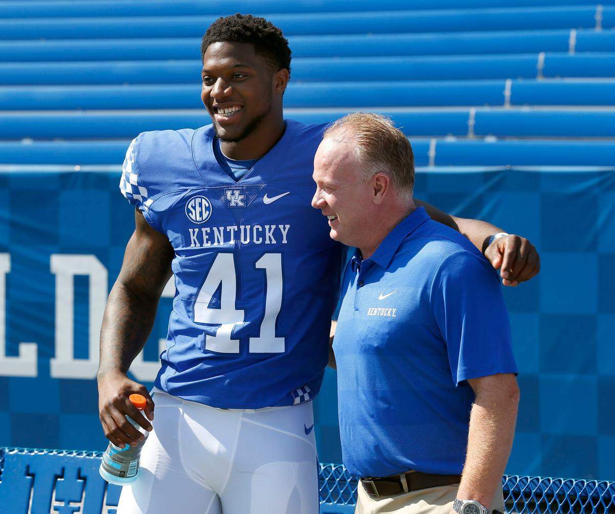 Kentucky linebacker Josh Allen hung out with Coach Mark Stoops at the team’s recent Media Day.  Stoops is pleased with how Allen has matured this year. “I know he’s got his head screwed on straight and I know he’s trying to do the right things.”