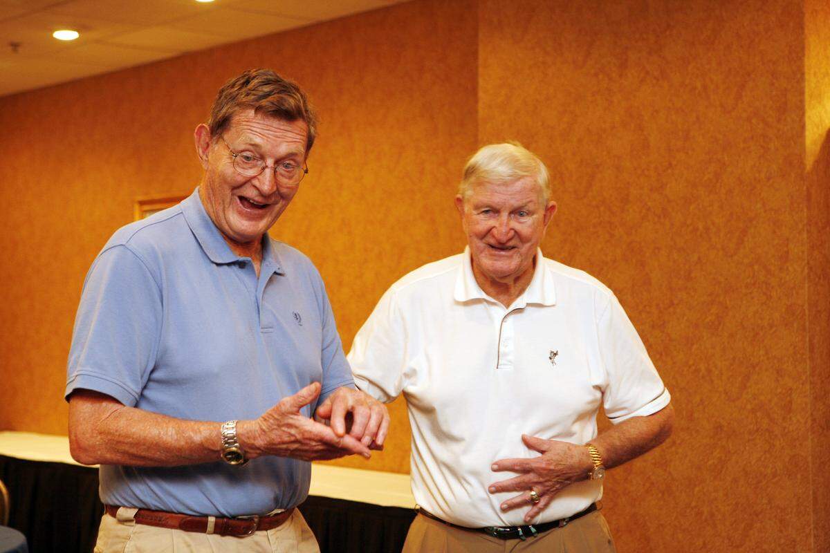 George Blanda, right, was the University of Kentucky quarterback in 1947 when the Wildcats won the first bowl game in school history, beating Villanova 24-14 in the Great Lakes Bowl in Cleveland. Blanda, shown in Lexington in 2009 during a reunior with former UK teammates, died in 2010 at age 83.