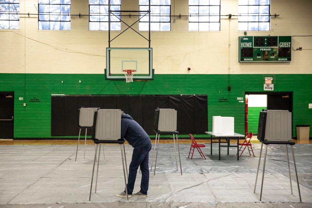 A Fayette County resident votes Tuesday at the Dunbar Center.
