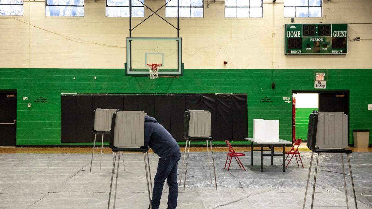 A Fayette County resident votes at the Dunbar Center in Lexington, Ky., on Tuesday, Nov. 3, 2020.