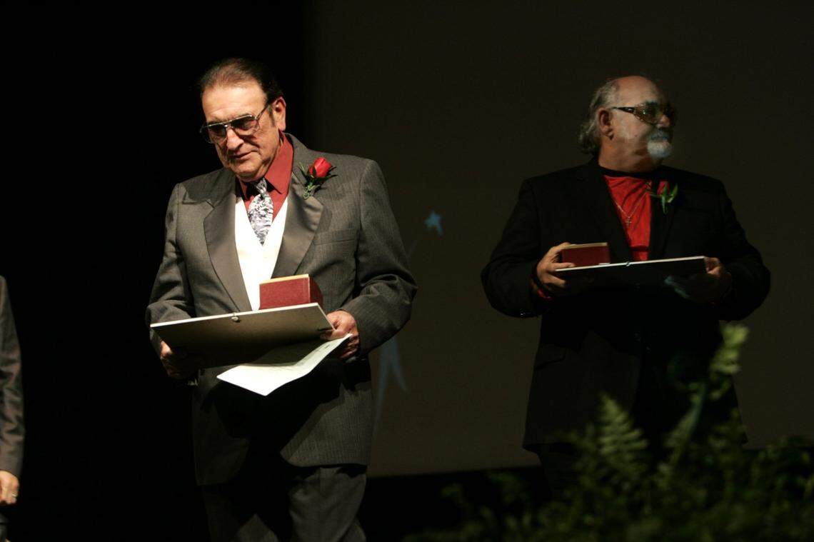 Bobby Osborne, left, and his brother Sonny, who wrote “Rocky Top” leave the stage after receiving their Kentucky Stars at The 2004 Kentucky Stars recognition ceremony at the Kentucky theater on tuesday October 26, 2004. Mark Cornelison/ Staff