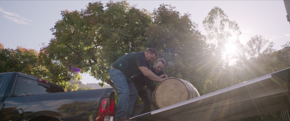A scene from “Heist” episode five shows bourbon barrels being loaded into the back of a pickup truck. At least 18 bourbon barrels were stolen from two Kentucky distilleries in a story that will be part of the new Netflix series.