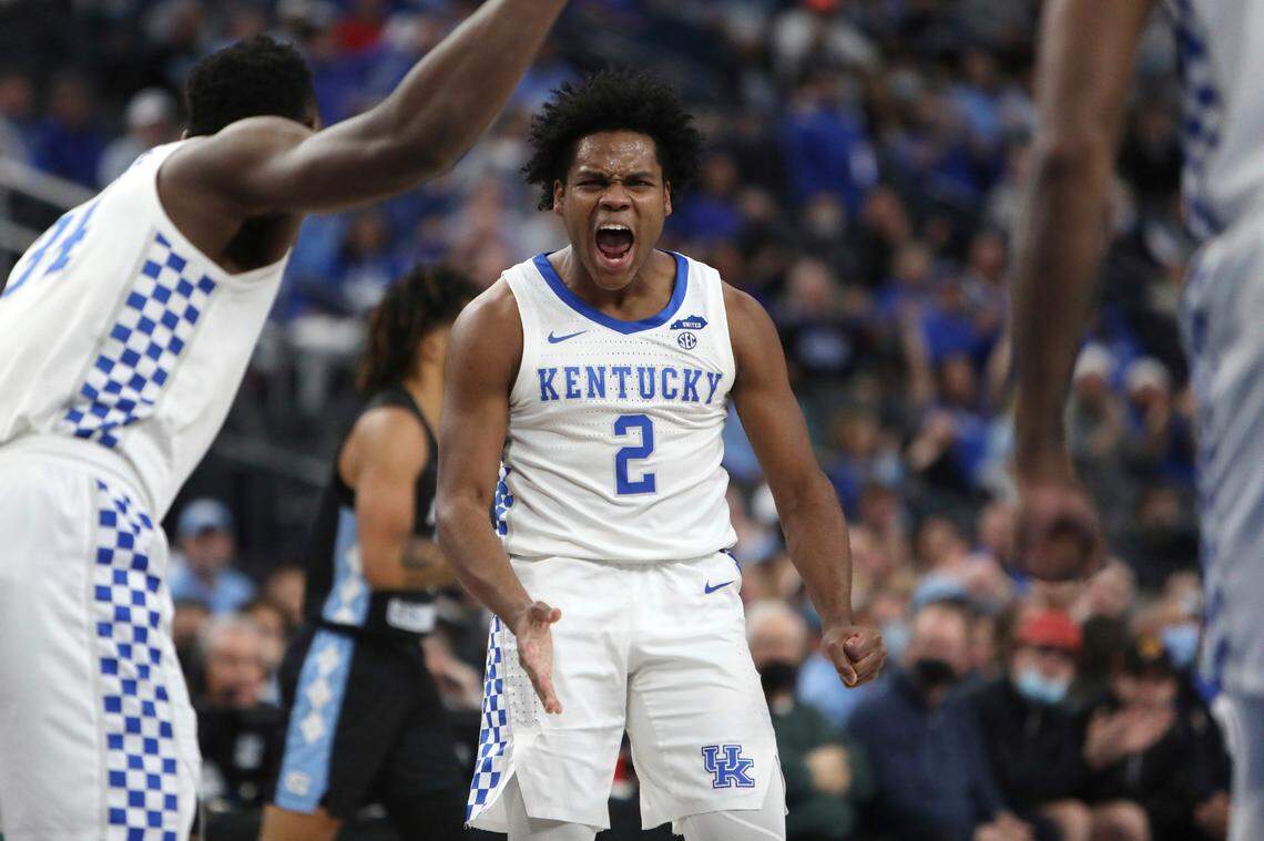Kentucky’s Sahvir Wheeler (2) reacts during the first half of an NCAA college basketball game against North Carolina, Saturday, Dec. 18, 2021, in Las Vegas.