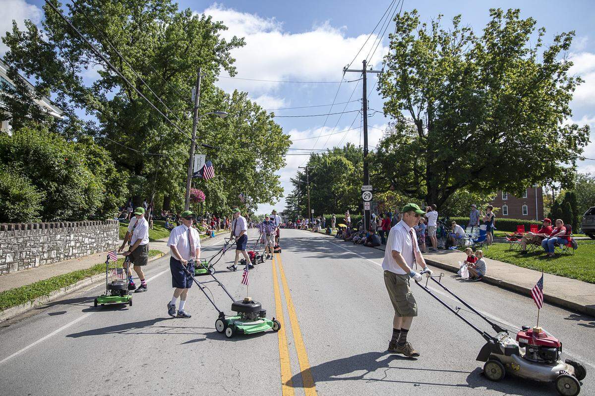 Members of the Lawn Mower Brigade participate in Wilmore’s Festival of the Fourth on July 4, 2019.