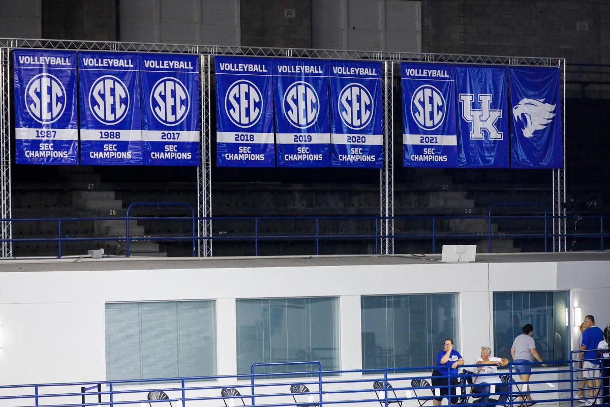 Banners for UK volleyball’s SEC championships hang in Memorial Coliseum. The Wildcat have won at least a share of the past five league titles.