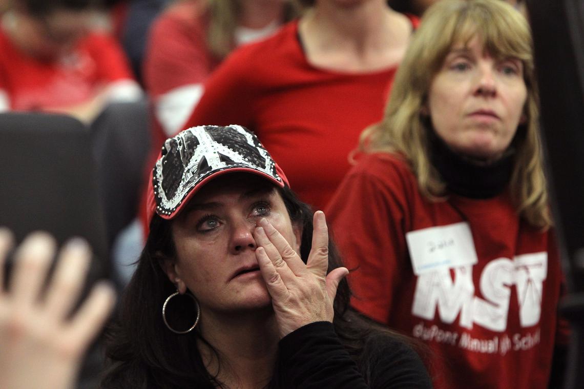 Lisa Galloway, a teacher for 27 years, wiped tears as HB 525 was passed in committee Thursday at the State Capitol in Frankfort. Photo by Matt Goins