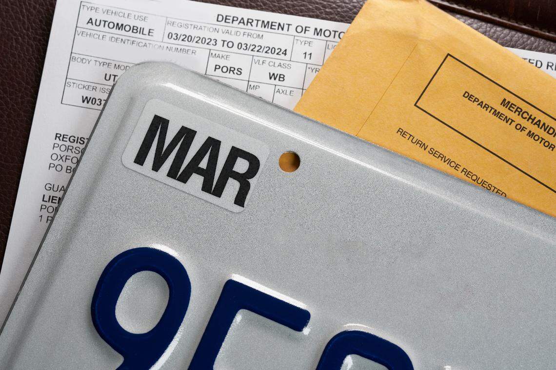 License plate registration for car with documents.