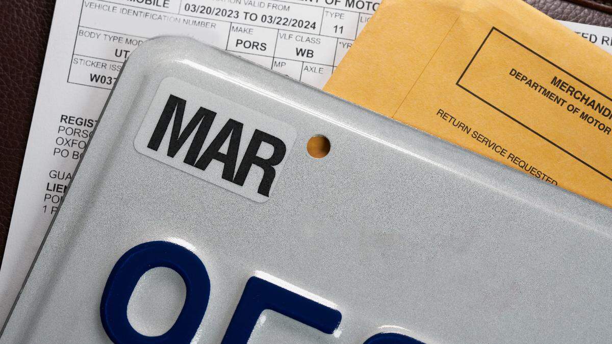 License plate registration for car with documents. DMV. USA