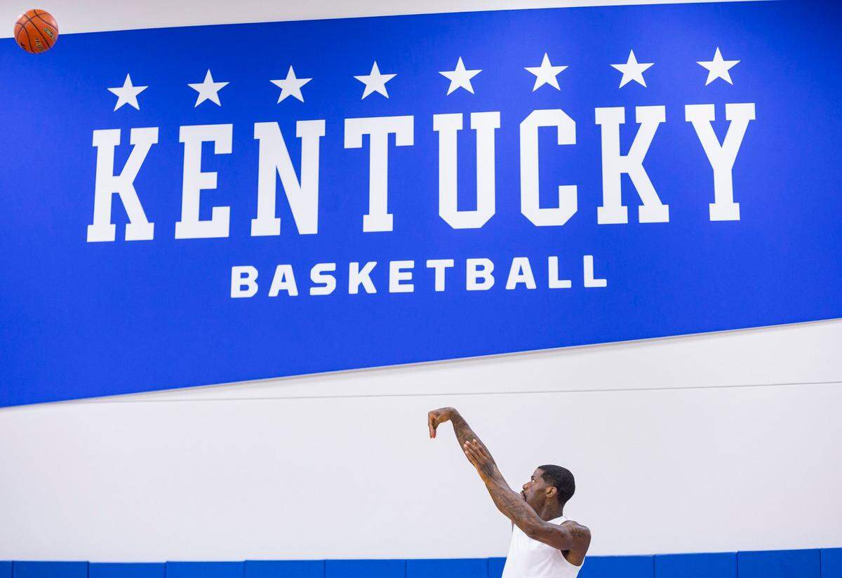 Former Wildcat Deandre Liggins put up shots during La Familia’s media day at the Joe Craft Center in Lexington on Monday.